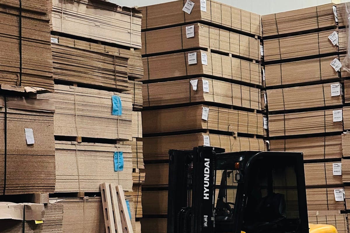 Bin store pallets with high piece count Amazon and Target inventory sorted into gaylord boxes